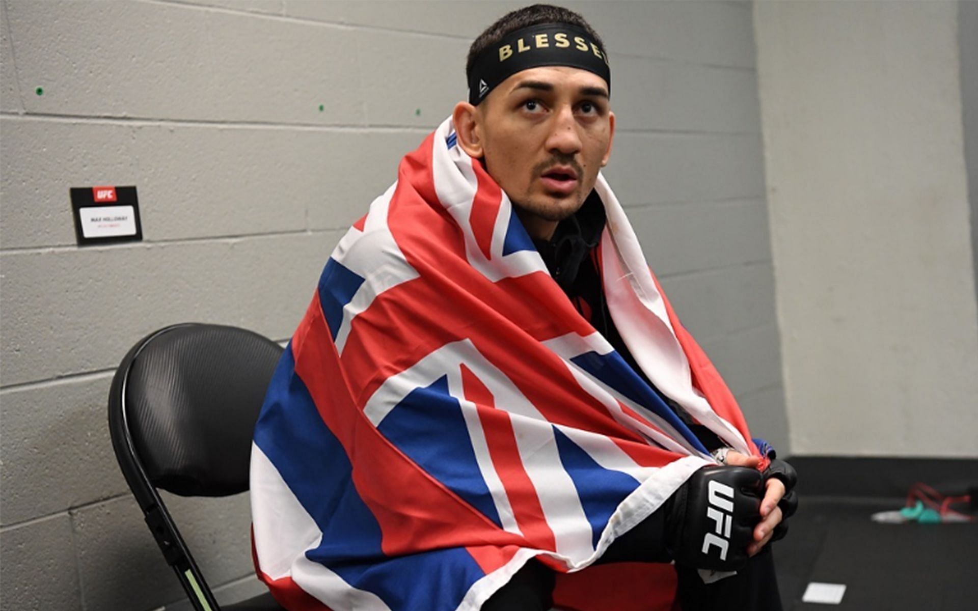 Discover the flag! What flag does Max Holloway carry and why?